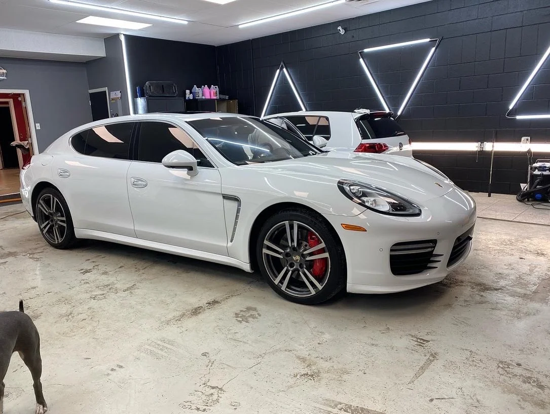 White Porsche Panamera after full detail at Paint Slayer Auto Spa